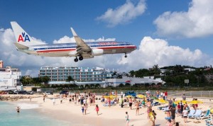 low flying plane over beach